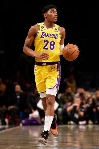 <p>Sarah Stier/Getty</p> Rui Hachimura dribbles during the first half against the Brooklyn Nets on January 30, 2023.