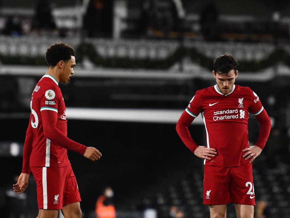 Trent Alexander-Arnold and Andrew Robertson react to their defeatLiverpool FC via Getty Images