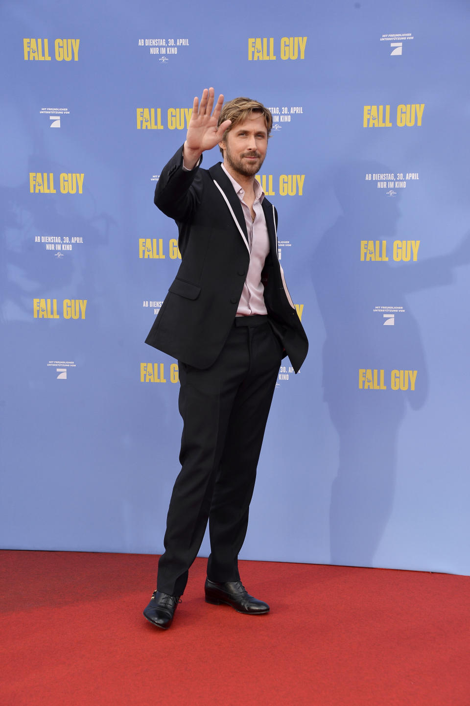 Gosling attends the "The Fall Guy" European premiere at UCI Luxe Mercedes Platz in black gucci loafers.