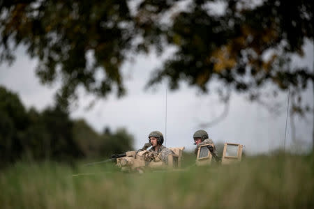 Troops from Skaraborg's Swedish regiments practice with a US-enhanced armoured gun company as a part of the preparations for Aurora 17 field exercise in Skovde, Sweden. Bjorn Larsson Rosvall/TT News Agency/via REUTERS