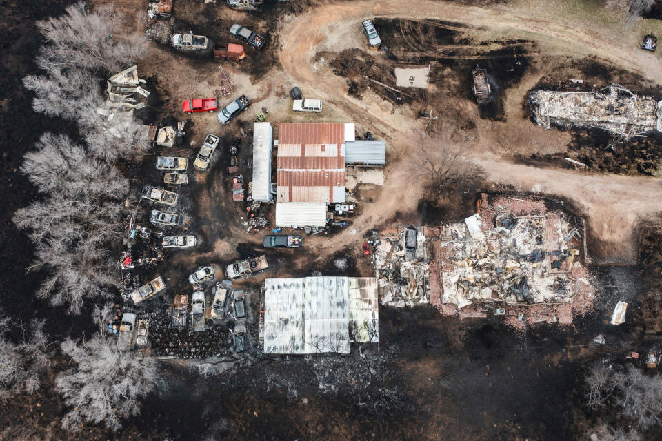 Multiple vehicles and multiple residences are seen destroyed by the Smokehouse Creek Fire in Canadian, Texas, on Feb. 29, 2024.<span class="copyright">David Erickson—AP</span>