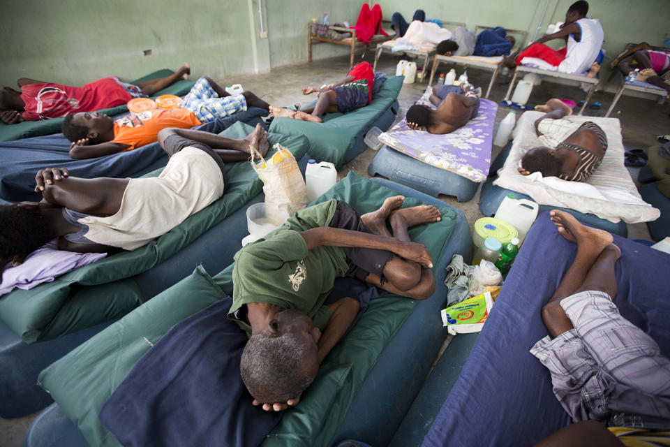 <p>Sick prisoners rest in the infirmary at the National Penitentiary in downtown Port-au-Prince, Haiti, Feb. 13, 2017. Haitian prosecutors and rights activists are sounding an alarm about collapsing conditions at the impoverished country’s prisons as malnutrition from acute food shortages and a slew of preventable illnesses are leading to an upsurge of inmate deaths. (Photo: Dieu Nalio Chery/AP) </p>