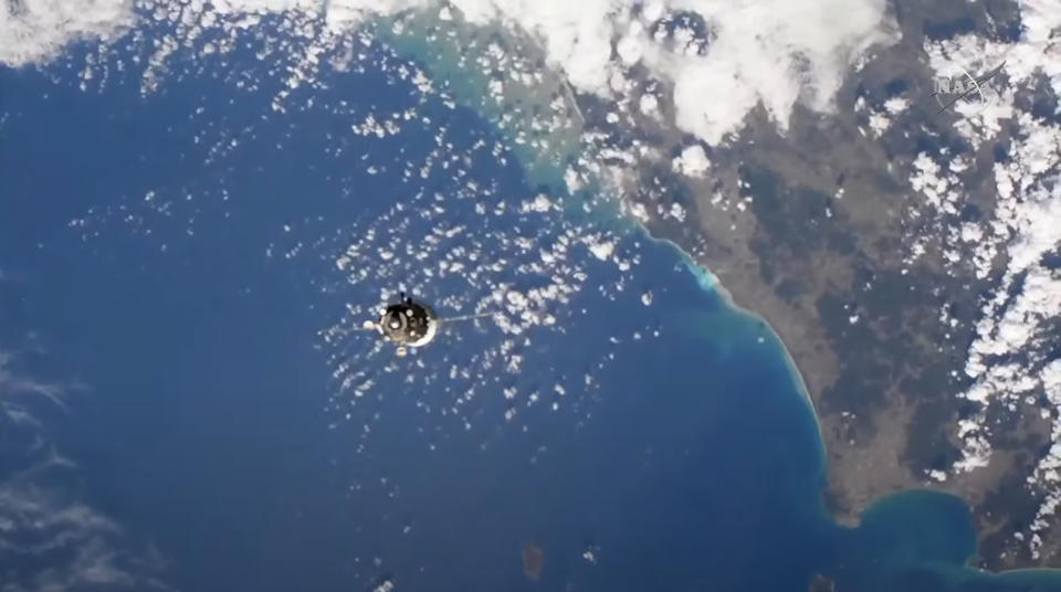 The Soyuz MS-19 spacecraft carrying Russian actress Yulia Peresild, producer-director Klim Shipenko and cosmonaut Anton Shklaperov approaches the International Space Station on Oct. 5, 2021 in this still from station cameras captured during docking operations.