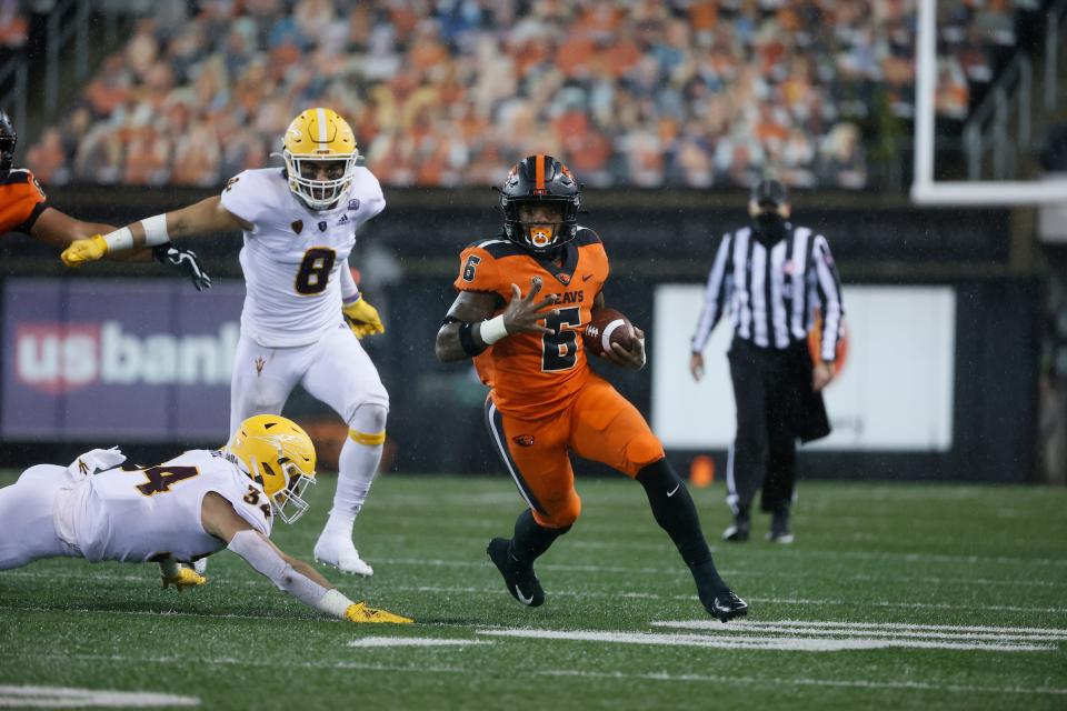 Oregon State running back Jermar Jefferson carries the ball against Arizona State on Dec. 19, 2020 in Corvallis, Ore.