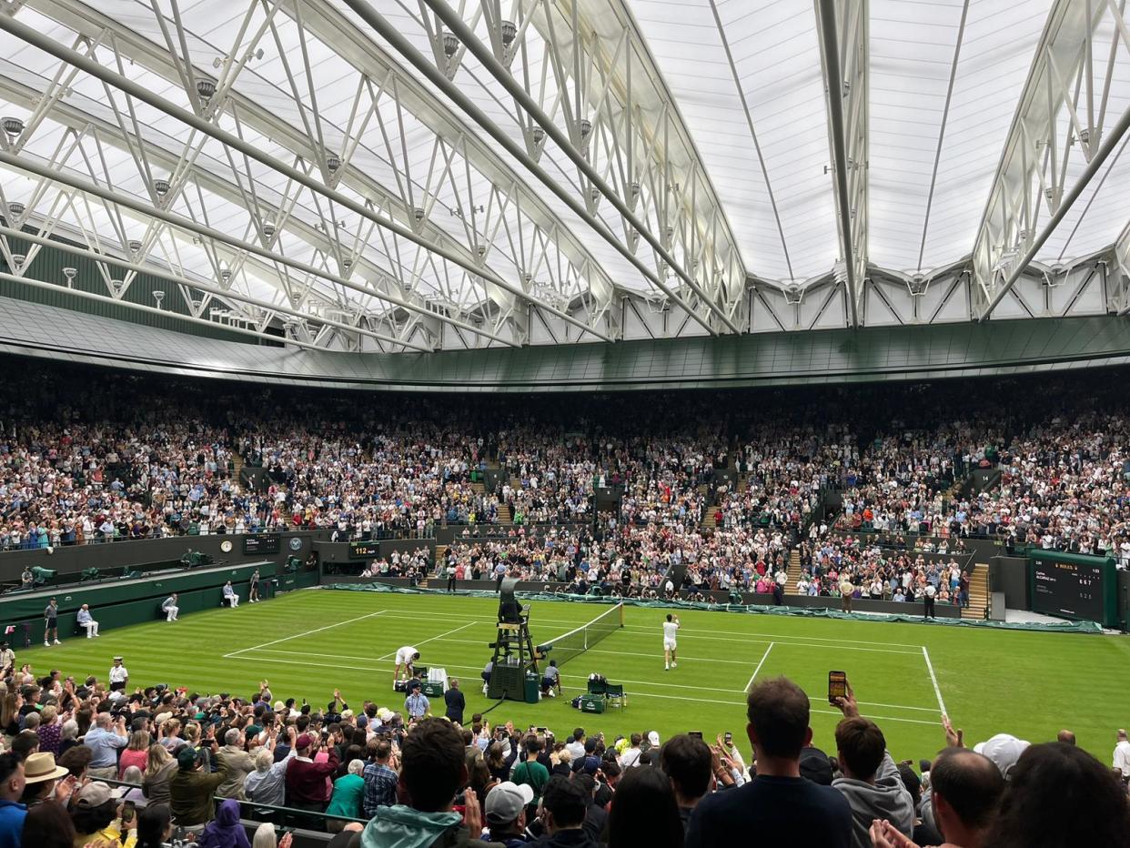 Carlos Alcaraz celebrates after beating Jeremy Chardy at Wimbledon (The Independent)