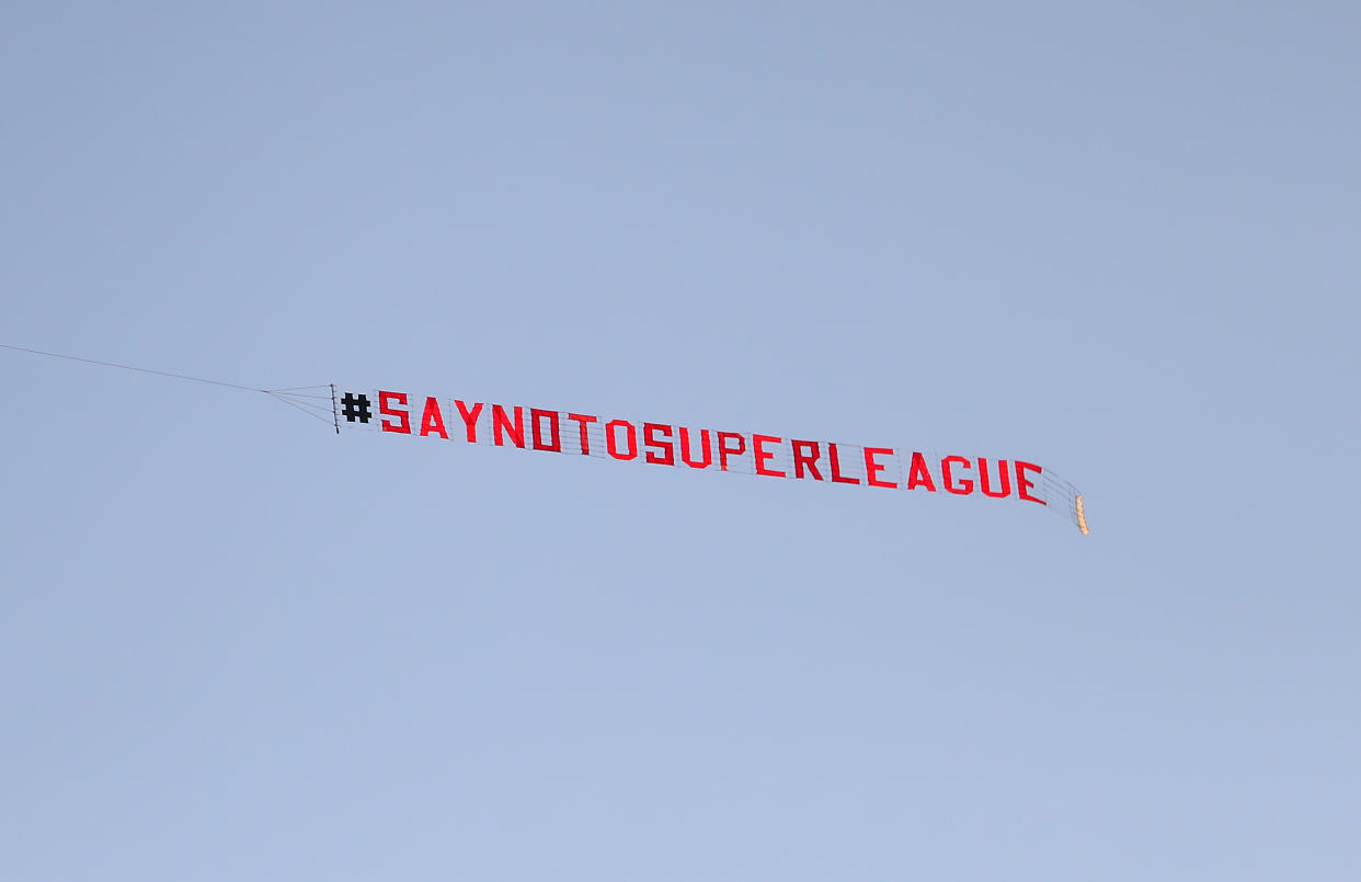File photo dated 19-04-2021 of A plane with a 'Say No To Super League' banner flying over Elland Road against Liverpool's decision to be included amongst the clubs attempting to form a new European Super League. Issue date: Wednesday May 12, 2021.
