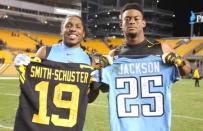 Nov 16, 2017; Pittsburgh, PA, USA; Tennessee Titans cornerback Adoree' Jackson (left) and Pittsburgh Steelers wide receiver JuJu Smith-Schuster (right) exchange jerseys after their game at Heinz Field. The Steelers won 40-17. Mandatory Credit: Charles LeClaire-USA TODAY Sports
