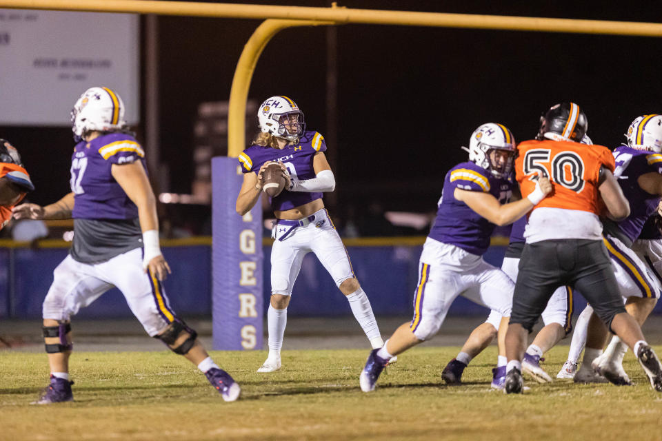 Union County quarterback AJ Cortese looks to pass during the game against Hawthorne High School at Union County High School in Lake Butler, FL on Friday, October 14, 2022. [Jesse Gann/Gainesville Sun]