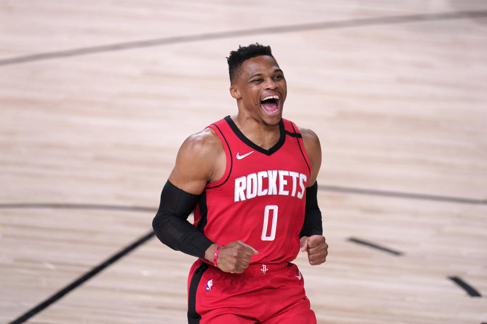 Houston Rockets' Russell Westbrook yells as he runs onto the court before an NBA conference semifinal playoff basketball game against the Los Angeles Lakers Thursday, Sept. 10, 2020, in Lake Buena Vista, Fla. (AP Photo/Mark J. Terrill)