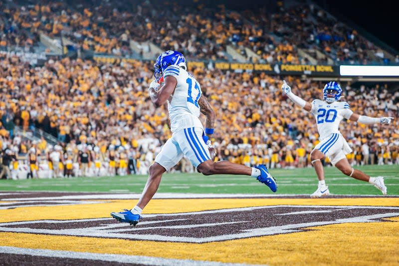 BYU football's Keelan Marion enters the end zone upon returning a kickoff for a touchdown against Wyoming on Sept. 14, 2024, in Laramie, Wyo. | BYU Photo