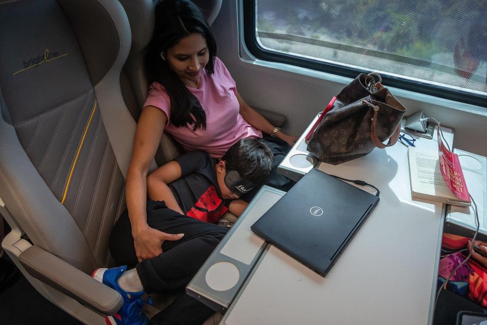 Renee Lorrain and Emiliano de Avila relax during the ride to Orlando on the Brightline train on September 22, 2023. The Bolivian citizens are on vacation in south Florida, she said.