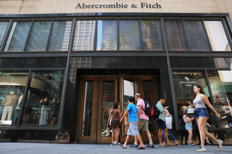 People walk past an Abercrombie & Fitch store on Fifth Avenue on August 25, 2022 in New York City. 