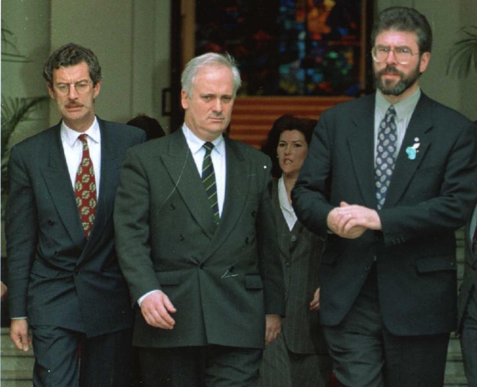 Bruton in 1995 with the Irish Labour leader Dick Spring and Gerry Adams: Bruton struck a working relationship with Adams that deteriorated after the London Docklands bombing the following year
