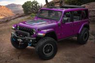 <p>Along with the eye-catching paint, this Wrangler Rubicon 4xe features Jeep's newly designed seven-slot grille, which <a href="https://www.caranddriver.com/news/a42814140/2023-jeep-wrangler-rubicon-20th-anniversary-editions-revealed/" rel="nofollow noopener" target="_blank" data-ylk="slk:debuted on the 20th Anniversary Editions;elm:context_link;itc:0;sec:content-canvas" class="link ">debuted on the 20th Anniversary Editions</a>. Its hood also has a unique decal with a two-tone appearance.</p>