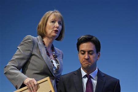 Britain's opposition Labour leader Ed Miliband (R) and deputy leader Harriet Harman attend the annual Labour party conference in Brighton, southern England September 22, 2013. REUTERS/Stefan Wermuth