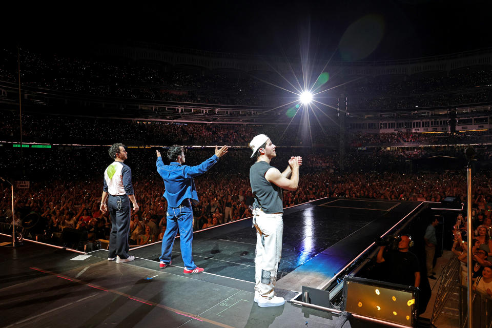 NEW YORK, NEW YORK - AUGUST 13: (L-R) Kevin Jonas, Joe Jonas, and Nick Jonas perform onstage during Jonas Brothers “Five Albums, One Night” Tour - New York at Yankee Stadium on August 13, 2023 in New York City. (Photo by Kevin Mazur/Getty Images for Live Nation)