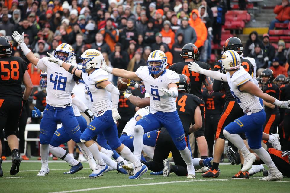 Catholic Memorial recovers a West De Pere fumble in the third quarter en route to a 37-24 win in the WIAA Division 3 State championship in Madison on Nov. 16, 2018.