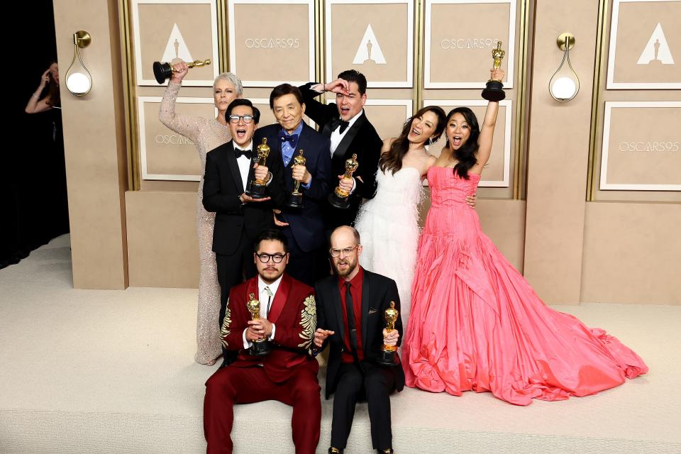 (L-R top row) Jamie Lee Curtis, winner of the Best Supporting Actress award, Ke Huy Quan, winner of the Best Actor In A Supporting Role award, James Hong, Jonathan Wang, winner of the Best Picture award, Michelle Yeoh, winner of the Best Actress in a Leading Role award, Stephanie Hsu and (L-R bottom row) Dan Kwan and Daniel Scheinert, winners of the Best Director and Best Picture award for "Everything Everywhere All at Once," pose in the press room during the 95th Annual Academy Awards on March 12, 2023 in Hollywood, California.
