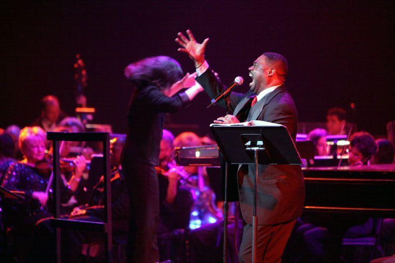 Tenor Rodrick Dixon and conductor Suzanne Mallare Acton at work in "Too Hot to Handel" at the Detroit Opera House.