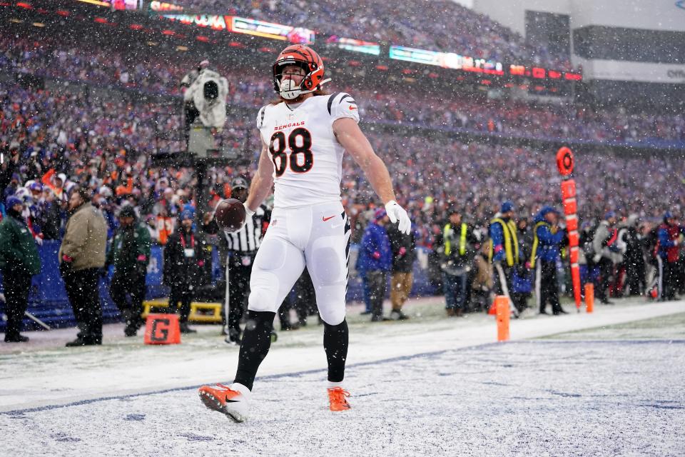 Hayden Hurst (88) celebrates a touchdown catch in the end zone against the Bills during the playoffs. The former Bengals tight end signed with the Carolina Panthers.