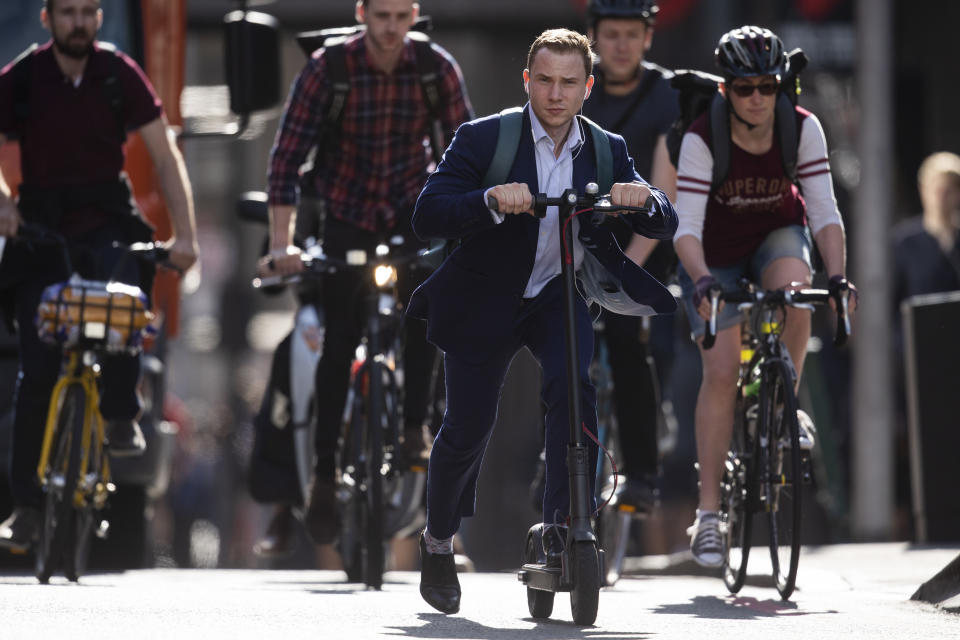 Workers cycle near London Bridge towards the City of London. Photo: Dan Kitwood/Getty Images