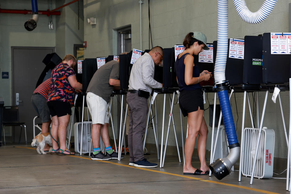 Voters cast their ballots in the Florida primary, Aug. 23
