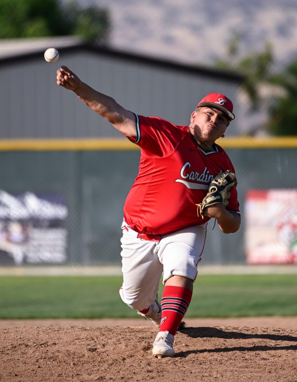 Lindsay's John Mosqueda pitches against Woodlake in a Central Section Division VI high school baseball semifinal Tuesday, May 21, 2024