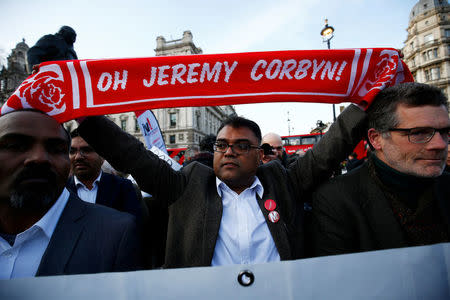 Supporters of Britain's opposition Labour Party attend a demonstration organised by the British Board of Jewish Deputies for those who oppose anti-Semitism, in Parliament Square in London, Britain, March 26, 2018. REUTERS/Henry Nicholls