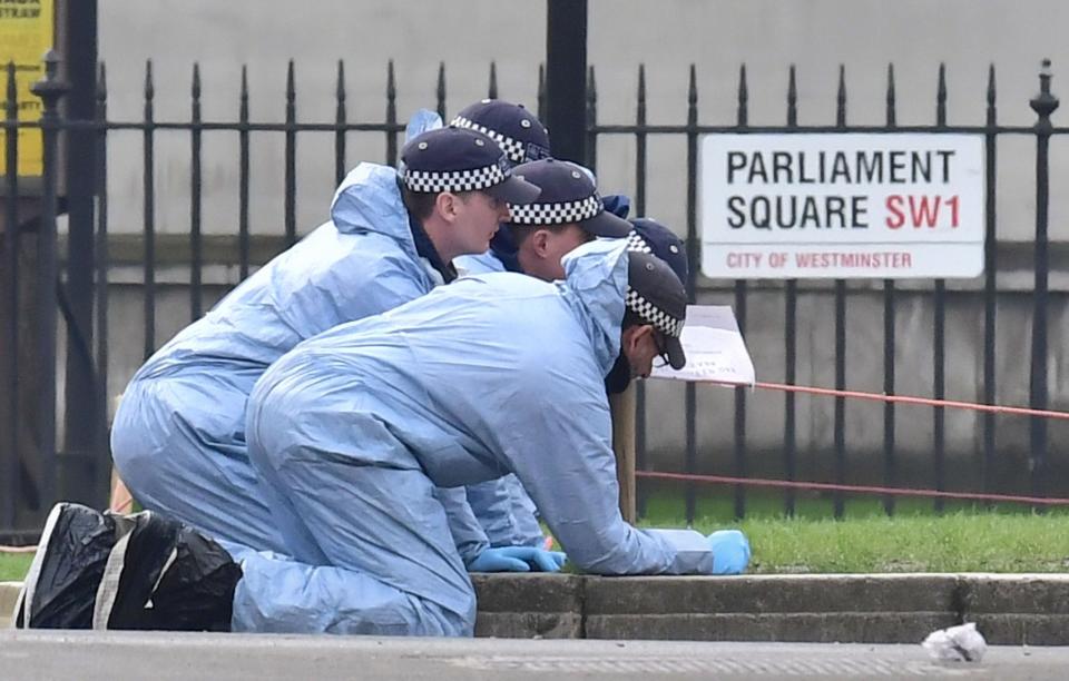 Forensic officers in Parliament Square morning after Westminster terror attack