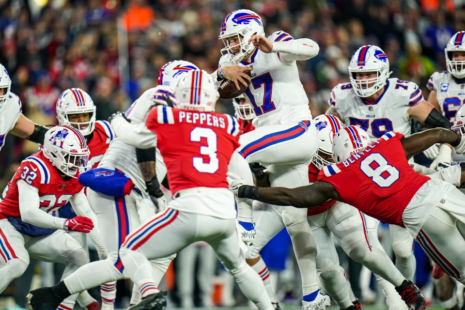 Josh Allen runs the ball against the New England Patriots in the first quarter in December.