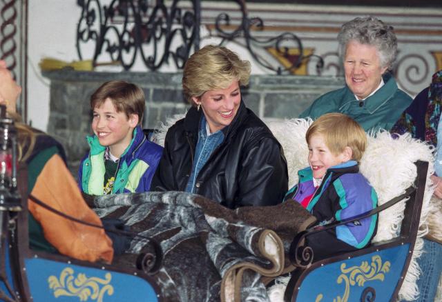 LECH,  AUSTRIA - MARCH 30:   Diana Princess of Wales with Prince William, and Prince Harry, and their Nanny Olga Powell ( right ), take an afternoon carriage ride, during their annual ski holiday, on March 30, 1993  in Lech, Austria. (Photo by Julian Parker/UK Press via Getty Images)