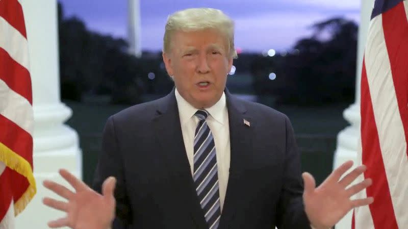 FILE PHOTO: U.S. President Donald Trump speaks at the White House after returning from hospitalization at the Walter Reed Medical Center for coronavirus disease (COVID-19) treatment, in Washington