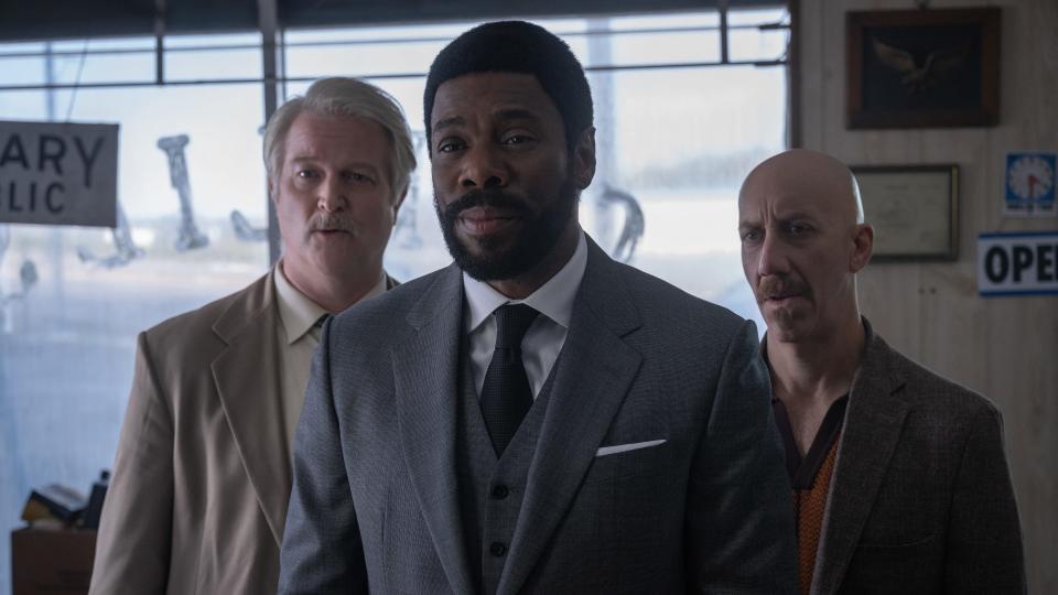 A crime boss (Colman Domingo, center) and his goons (C.J. Wilson and Joey Slotnick) seek a missing briefcase in "Drive-Away Dolls."