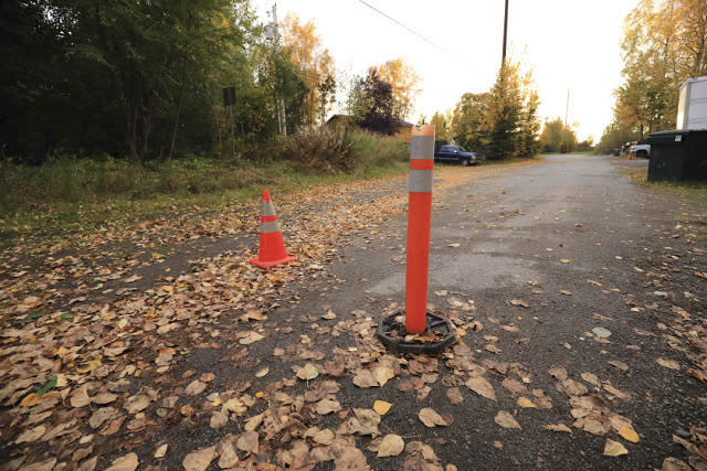 In this photo taken Monday, Sept. 24, 2018, leaves litter a street that was the scene of a 2017 attack on a woman in Anchorage, Alaska. Sexual violence advocates say the sentencing of defendant Justin Schneider to two years in prison with one suspended was too lenient and they're asking voters to not retain the sentencing judge in Alaska's November election. (AP Photo/Dan Joling)