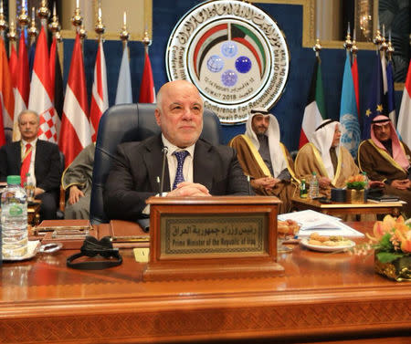 Iraqi Prime Minister Haider al-Abadi attends the Kuwait International Conference for Reconstruction of Iraq, in Bayan, Kuwait, February 14, 2018. Iraqi Prime Minister Media Office/via REUTERS