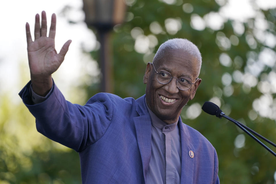 FILE - U.S. Rep. Don McEachin D-4th. waves during a rally for Democratic gubernatorial candidate, former Virginia Gov. Terry McAuliffe in Richmond, Va., Saturday, Oct. 23, 2021. Voters in a Richmond-based Virginia congressional district will settle a special election Tuesday, Feb. 21, 2023, for the open seat previously held by the late Rep. McEachin, who died in November shortly after being elected to a fourth term. Democratic nominee Jennifer McClellan faces GOP opponent, pastor Leon Benjamin. (AP Photo/Steve Helber, File)