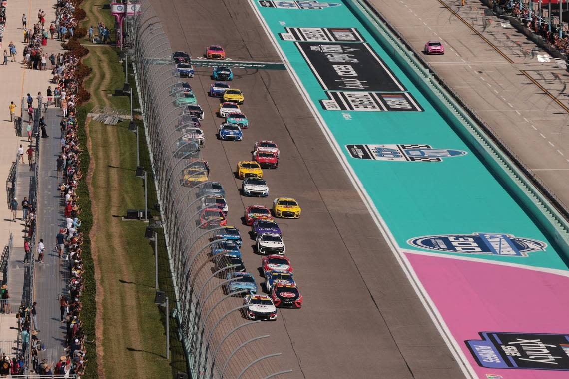 Cars race pass the starting line during the start of the Dixie Vodka 400. On Sunday, October 23, 2022 the NASCAR Cup Series Round of 8 continued with the Dixie Vodka 400, a NASCAR Cup Series race at Homestead–Miami Speedway in Homestead, Florida.