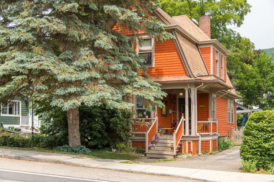 Conveniently located on Main Street, the bright-orange home is just a short, 90-minute train ride from Manhattan.