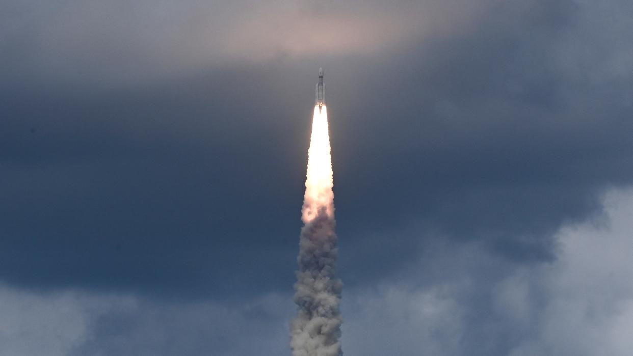  chandrayaan 3 launching through the clouds.  