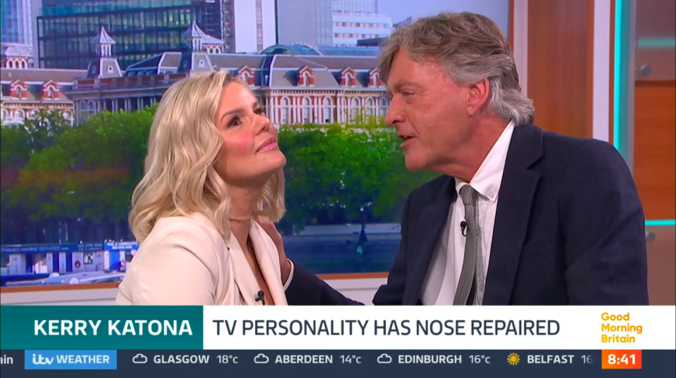 Kerry Katona's reconstructed nose being inspected by the co-presenter. (ITV screenshot)