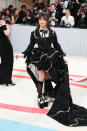 <p>Jenna Ortega in Thom Browne, including a pair of lace-up platform spectator pumps. </p>