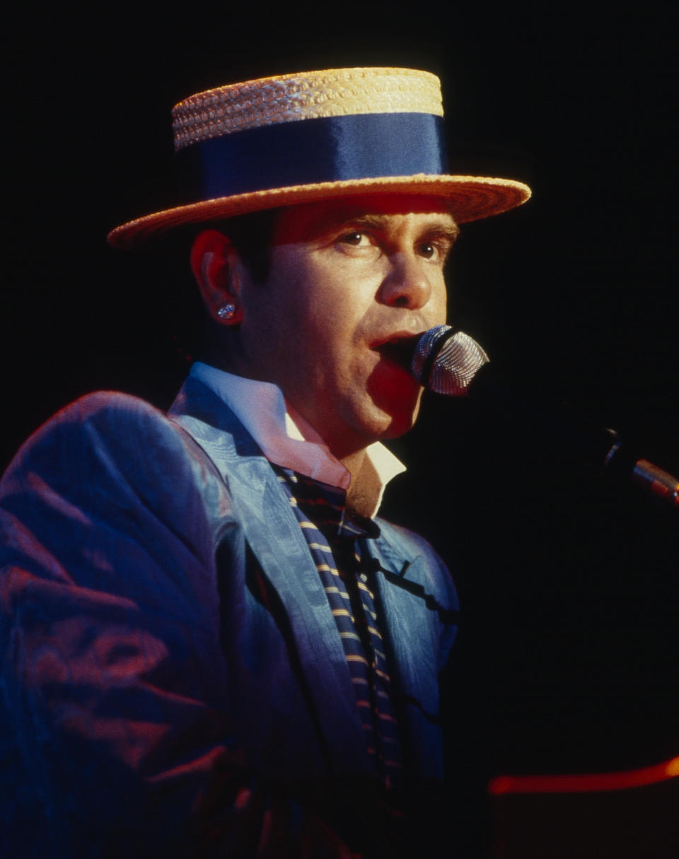 British musician Elton John (born Reginald Dwight) performs in concert, August 26,1984 at Irvine Meadows Amphitheater in Irvine, California.  (Photo by Bob Riha, Jr./Getty Images)