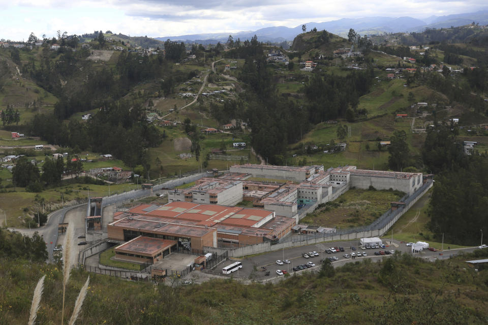 View of the Turi jail where dozens of prison guards and police officers have been kidnapped by the inmates, in Cuenca, Ecuador, Thursday, Aug. 31, 2023. In the last 24 hours, Ecuador has been rocked by the explosions of four car bombs and the hostage-taking of more than 50 law enforcement officers inside various detention facilities. (AP Photo/Xavier Caivinagua)