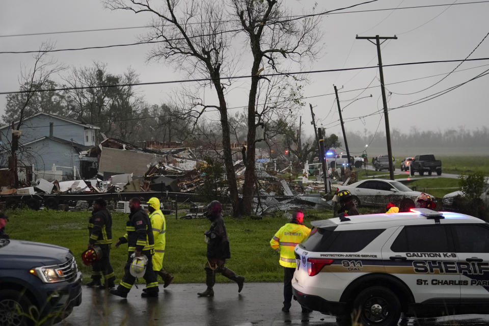 Destruction is seen from a tornado that tore through the area in Killona, La., about 30 miles west of New Orleans in St. James Parish, Wednesday, Dec. 14, 2022. (AP Photo/Gerald Herbert)