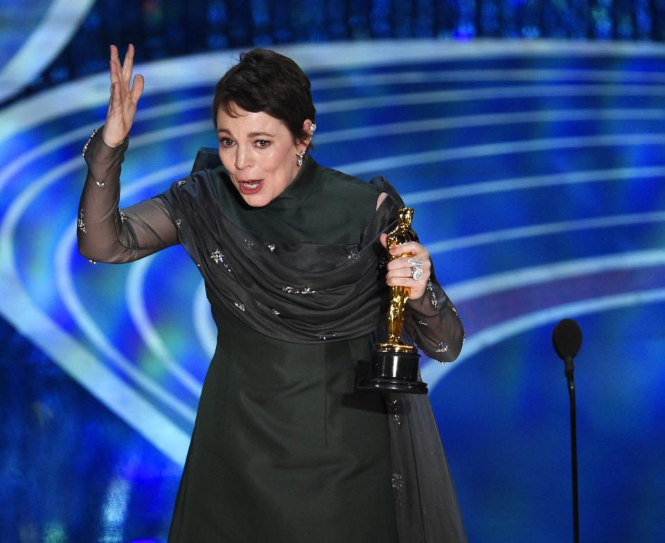 Olivia Colman reacts as she accepts the award for best performance by an actress in a leading role for "The Favourite" at the Oscars on Sunday, Feb. 24, 2019, at the Dolby Theatre in Los Angeles. (Photo by Chris Pizzello/Invision/AP)