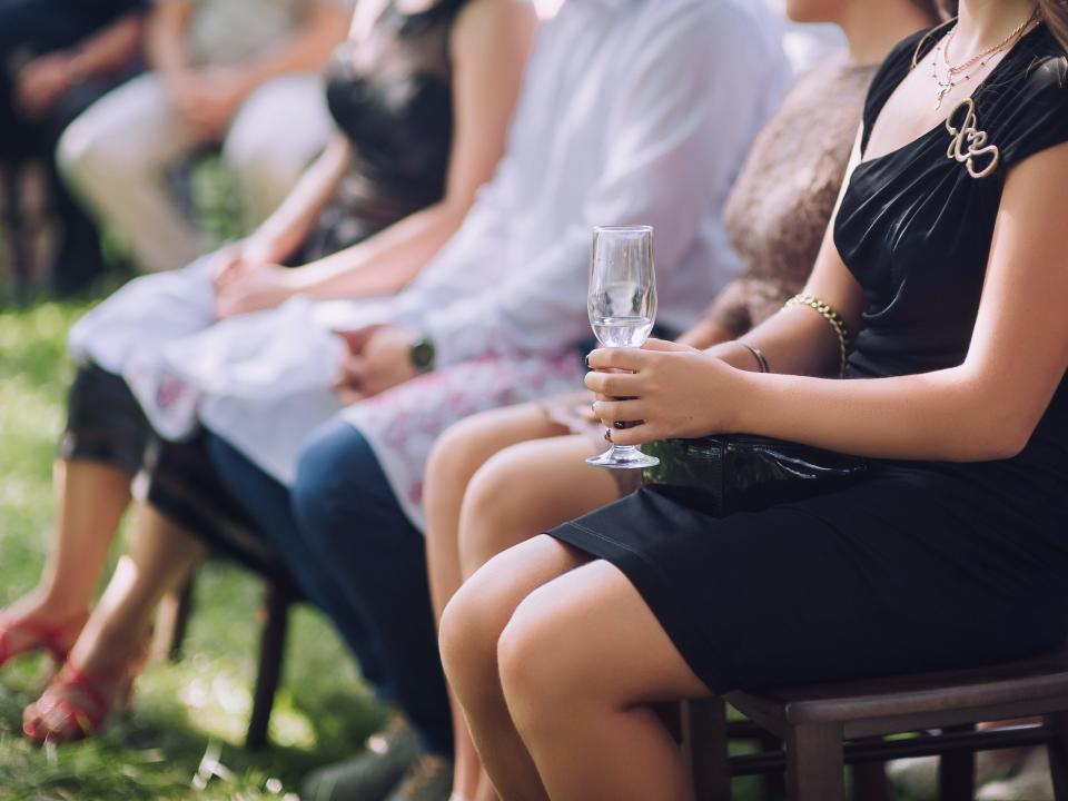 guests sitting at a wedding ceremony