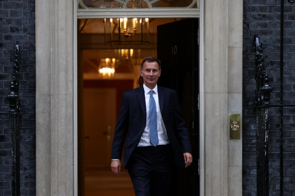 New Chancellor of the Exchequer Jeremy Hunt leaves 10 Downing Street in London, Britain, October 14, 2022. REUTERS/Henry Nicholls