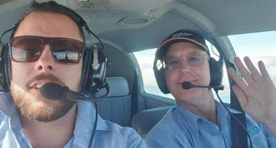 Matthew Hills (left) and his father Jeff Hills (right) in a plane together.