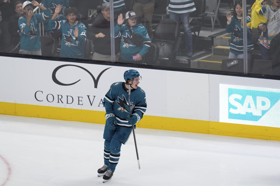 San Jose Sharks center Macklin Celebrini skates on the ice after his goal during the first period of an NHL hockey game against the St. Louis Blues, Thursday, Oct. 10, 2024, in San Jose, Calif. (AP Photo/Godofredo A. Vásquez)