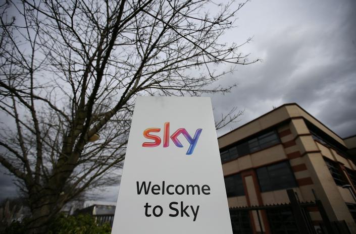 A Sky logo is pictured on a sign next to the entrance to pay-TV giant Sky Plc's headquarters in Isleworth, west London March 17, 2017. - A proposed multi-billion takeover bid for European pay-TV giant Sky by 21st Century Fox will be investigated by media watchdog Ofcom and the Competition and Markets Authority, the government said late on March 16.  Media magnate Rupert Murdoch's Fox announced in December that it had reached a formal agreement to buy its 61 percent stake.  in Sky that it does not already own.  (Photo by Daniel LEAL / AFP) (Photo by DANIEL LEAL / AFP via Getty Images)